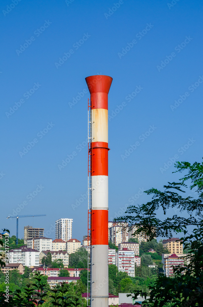 White-red metal pipe of the boiler chimney White-red metal pipe of the boiler chimney