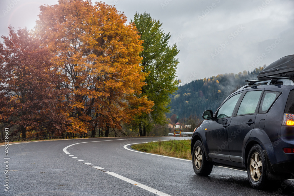 car for traveling. Autumn mountains