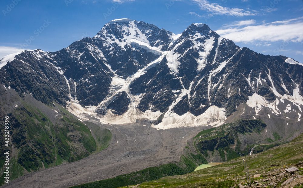 Glacier Seven on mount Donguz run. View from Mount Cheget, Kabardino Balkaria region. Russia. 3000 metres height. - obrazy, fototapety, plakaty 