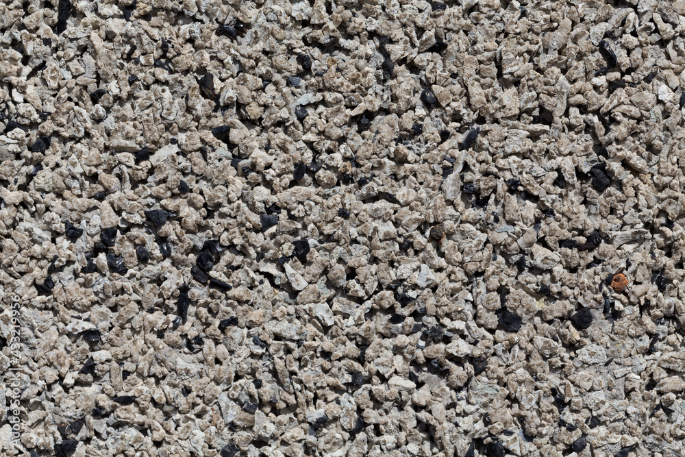 Crushed granite stones wall - close up Crushed granite stones wall - close up