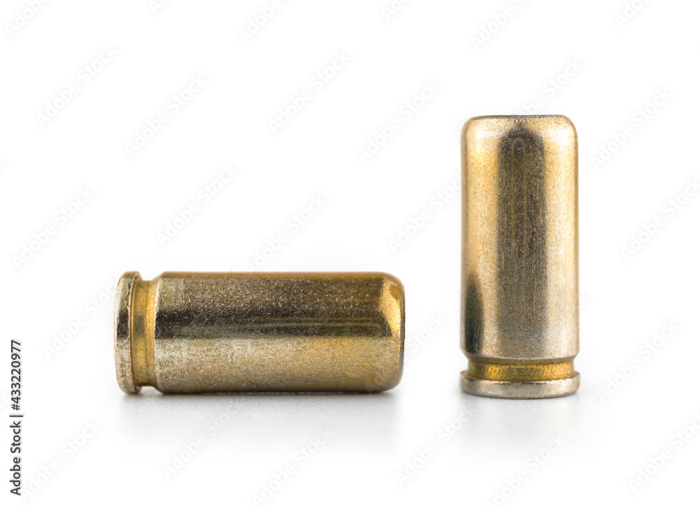 9mm bullet for a pistol isolated on white background, cartridges for a gun close-up photo 9mm bullet for a pistol isolated on white background, cartridges for a gun close-up photo