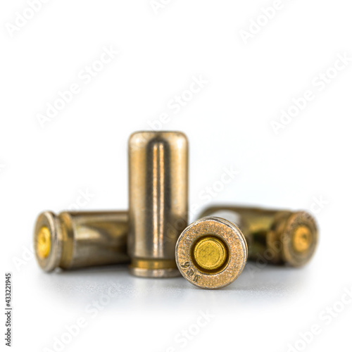 Print op canvas 9mm bullets isolated on white background, close-up view, ammo for a gun