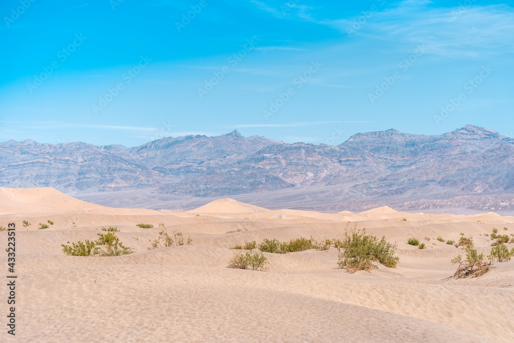 Scenic view on a hot day of the Mesquite Flat Sand Dunes in Death Valley, USA