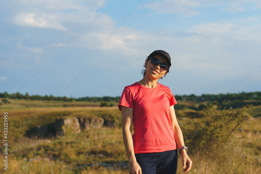 sporty woman in sunglasses