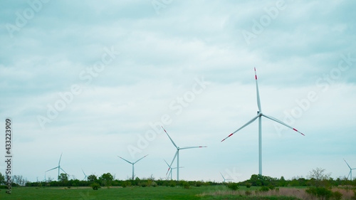 Wind generators in the field. Alternative energy sources © SEA_Ekaterina