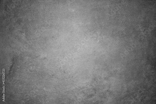 Minimal abstract dark concrete and cement wall and tiles background. Visible texture and pattern. With copy space. 