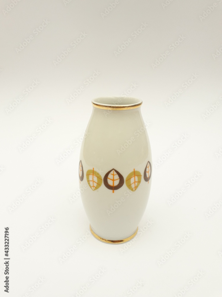 Mid-century modern porcelain vse with leaves pattern isolated