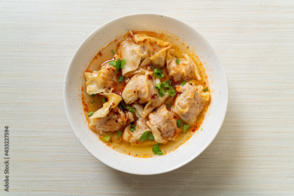 pork wonton soup or pork dumplings soup with roasted chili pork wonton soup or pork dumplings soup with roasted chili