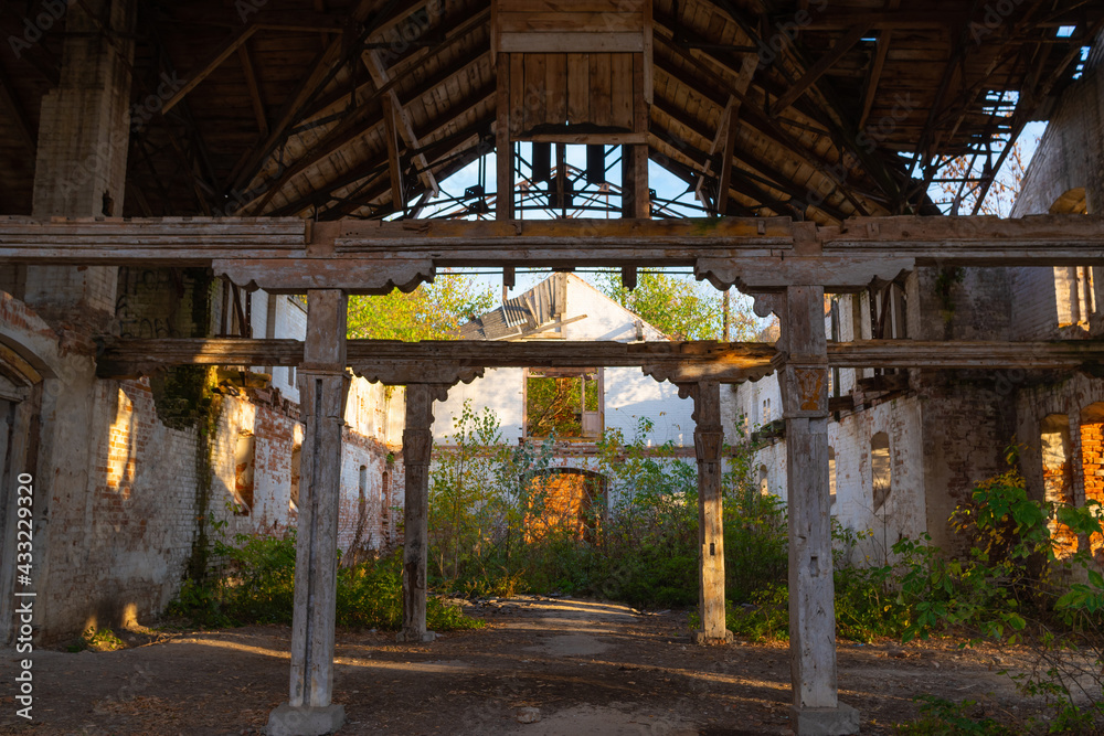 Old wooden structures in an abandoned stable in the Natalyevka estate, Kharkiv region, Ukraine Old wooden structures in an abandoned stable in the Natalyevka estate, Kharkiv region, Ukraine
