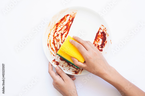 High angle view of dirty white plate on white background