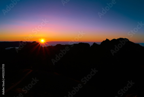 sunset above clouds on mountain highland peaks  Madeira Island  Pico do Areeiro  1818 meters altitude
