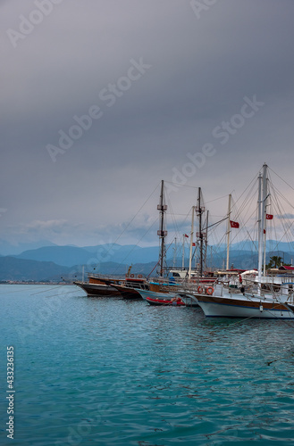 Yachts in the port of Fethiye  Turkey in the evening against the backdrop of mountains