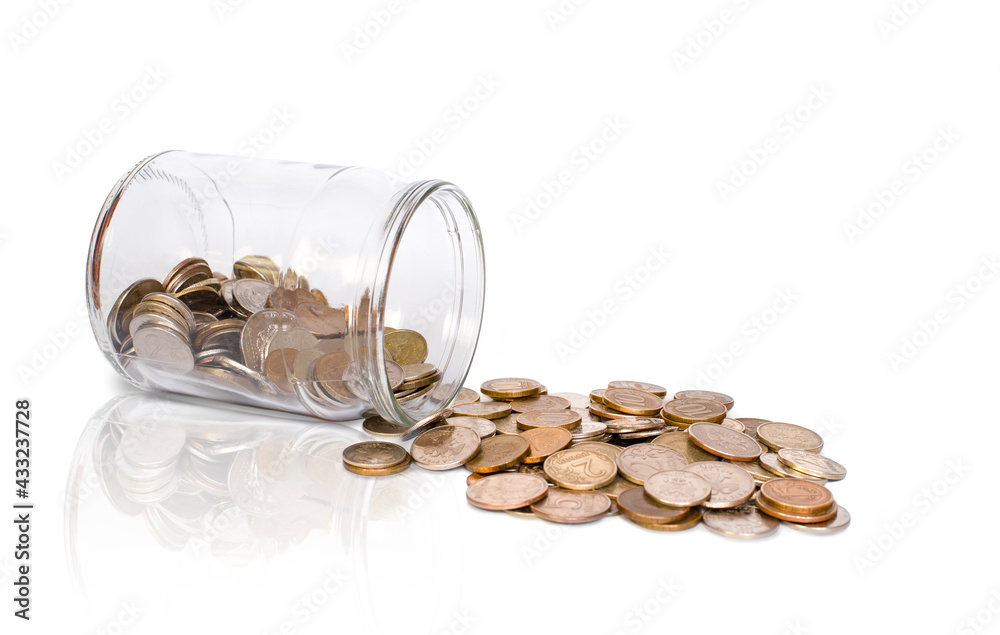 bank and scattered coins on a white background bank and scattered coins on a white background