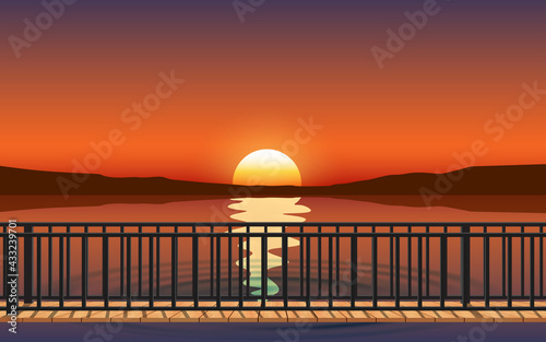 landscape of wooden bridge on the beach in sunset