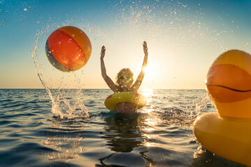 Happy child having fun on summer vacation
