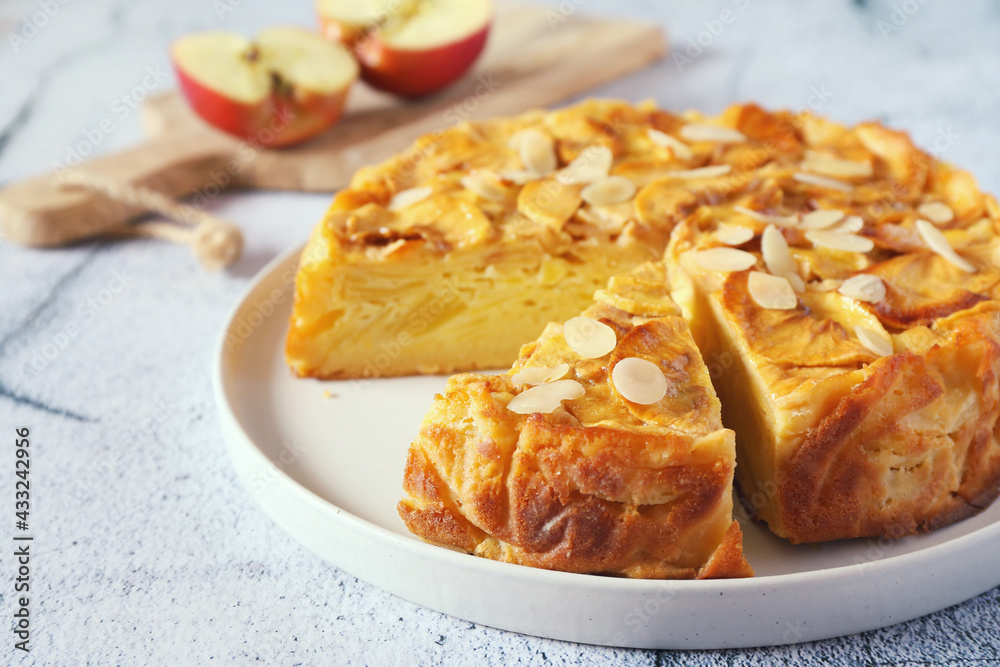 French cuisine. Invisible apple tart, almond petals dressing French cuisine. Invisible apple tart, almond petals dressing