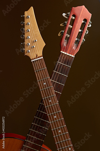Electric and classical acoustic guitar fretboards