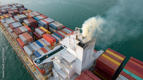 Smoke exhaust gas emissions from cargo lagre ship ,Marine diesel enginse exhaust gas from combustion. photo