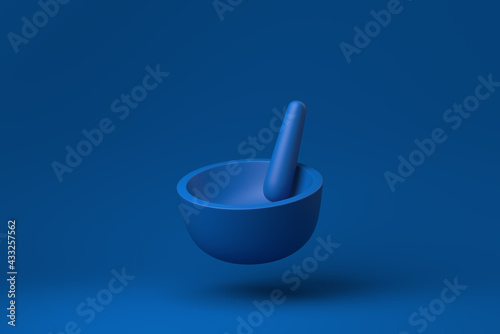 Blue Mortar and pestle floating in blue background. minimal concept idea creative. monochrome. 3D render.