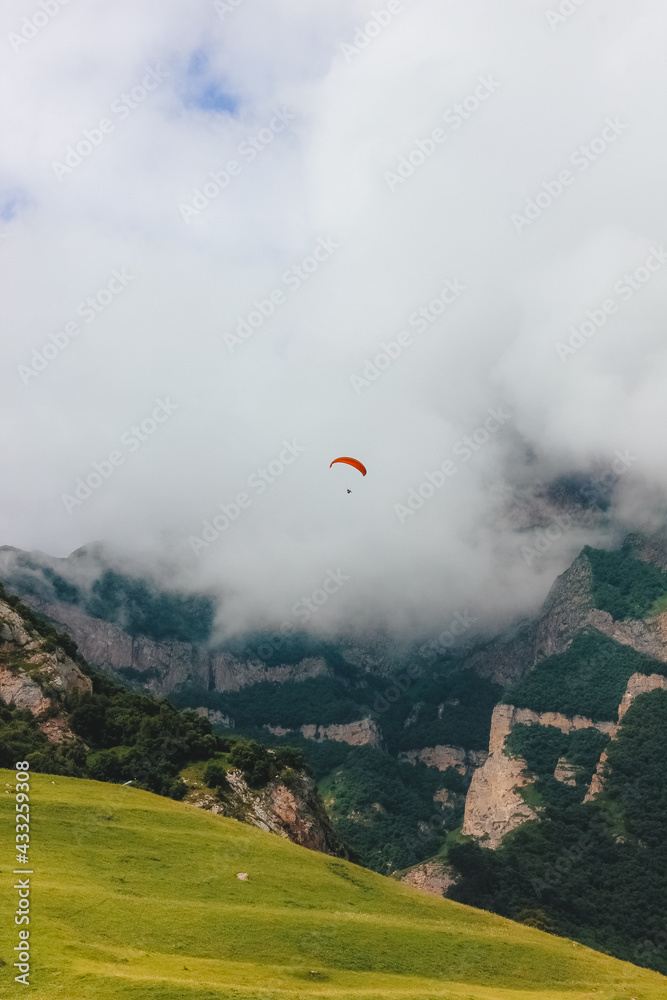 Fototapeta premium Paragliding flights. Chegem. Republic of Kabardino-Balkaria. Caucasus.