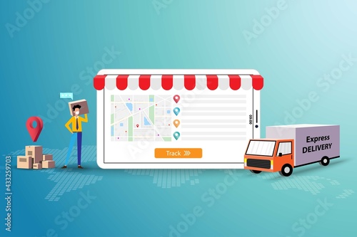 Concept of express delivery service, businessman wear a medical face mask and standing near a big screen of tablet to track and follow up the shipment to deliver the goods on time.