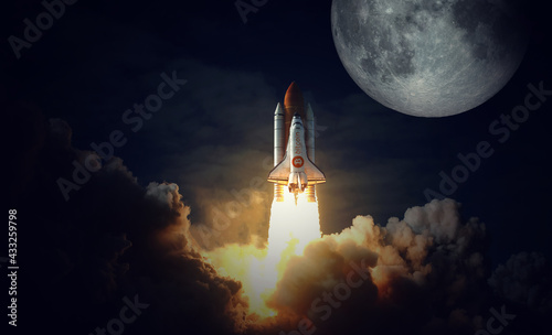 Space Shuttle with bitcoin icon takes off into space fly to the moon. Elements of this image furnished by NASA.
