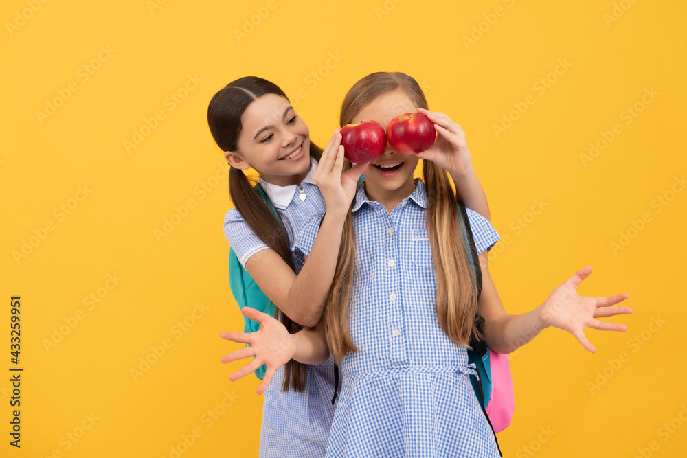 Fruit for the fruity face. Happy friends have fun with apples. Fruit makes you beautiful Fruit for the fruity face. Happy friends have fun with apples. Fruit makes you beautiful