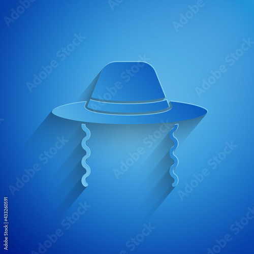 Paper cut Orthodox jewish hat with sidelocks icon isolated on blue background. Jewish men in the traditional clothing. Judaism symbols. Paper art style. Vector