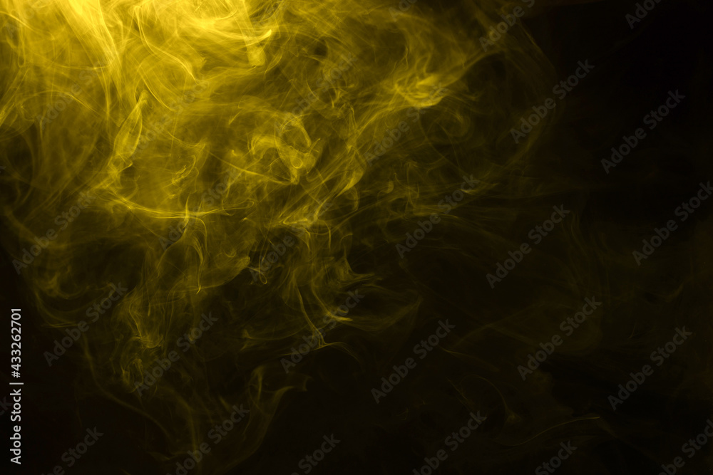 Yellow and pink steam on a black background. Yellow and pink steam on a black background.