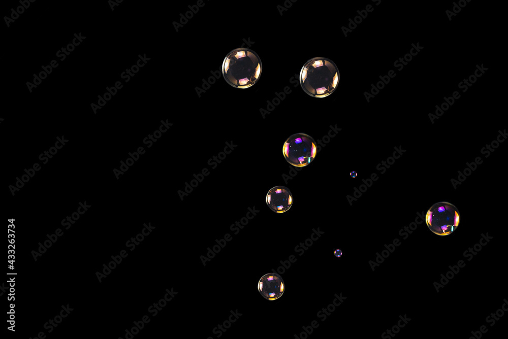 Soap bubbles isolated on a black background Soap bubbles isolated on a black background