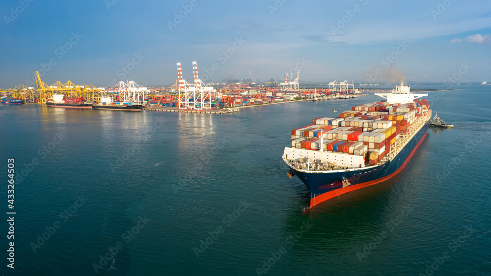 Aerial in front of smart cargo ship carrying container and running near international custom sea port for export cargo, webinar banner