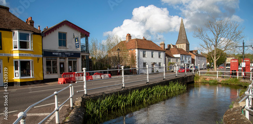 Fototapeta Naklejka Na Ścianę i Meble -  Stockbridge, Hampshire, England, UK. 2021. Stockbridge main street with colourful buildings where drovers  drove their sheep and cattle. One of the smallest towns in United Kingdom