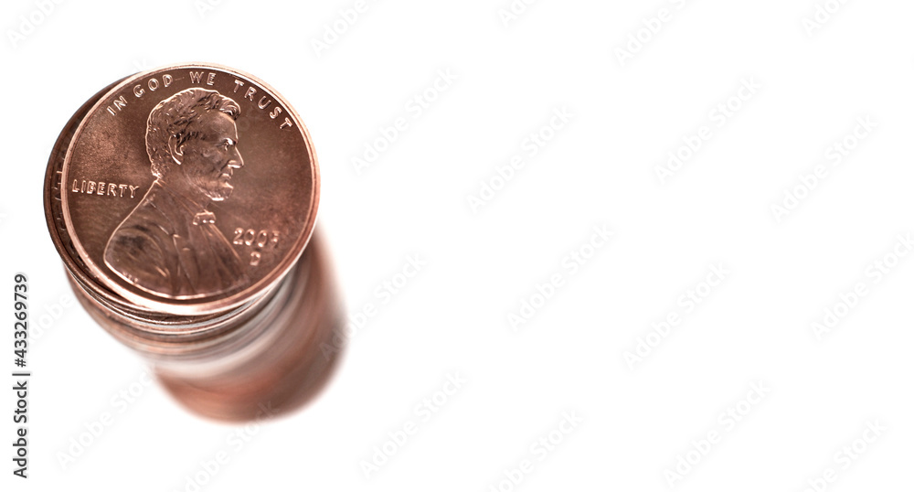Stack of Pennies on White Background representing savings and wealth Stack of Pennies on White Background representing savings and wealth