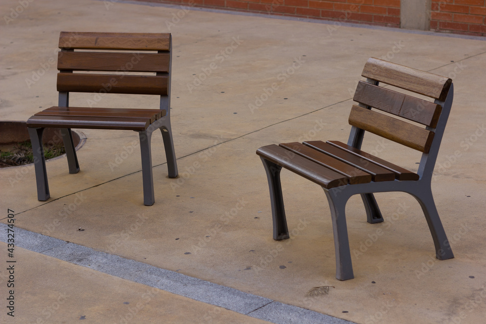 Empty chair in urban environment