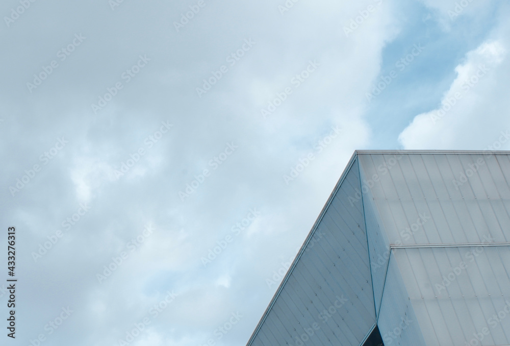 Minimal abstract architectural lines against cloudy sky Minimal abstract architectural lines against cloudy sky