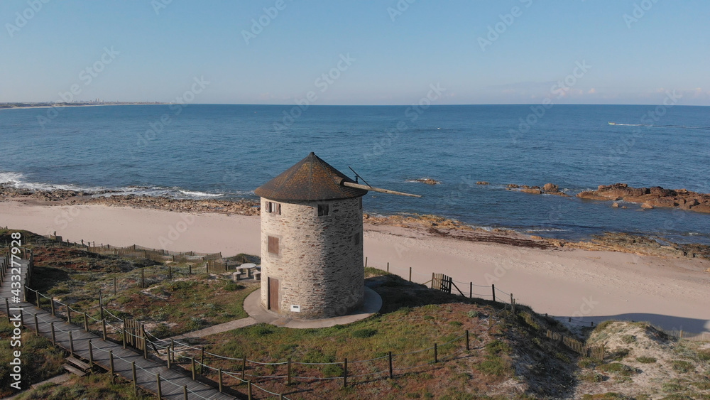 DRONE AERIAL VIEW: The ancient windmill and 