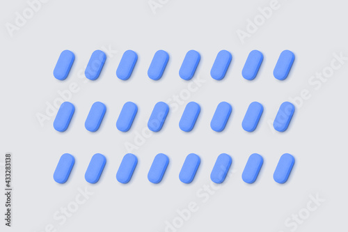 Light blue pills arranged on a neutral background. Medication for male impotence.