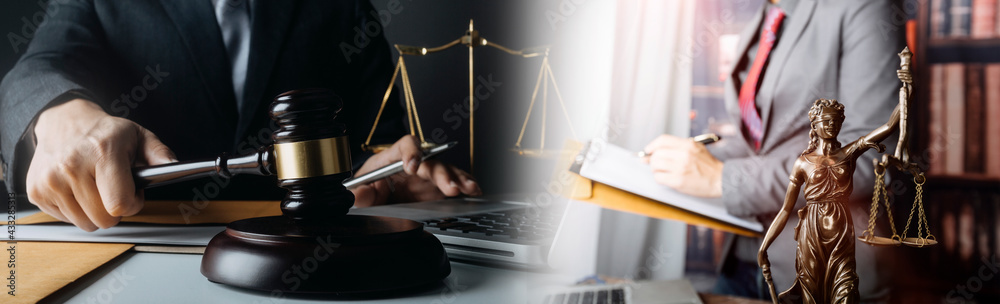 Obraz premium Business and lawyers discussing contract papers with brass scale on desk in office. Law, legal services, advice, justice and law concept picture with film grain effect