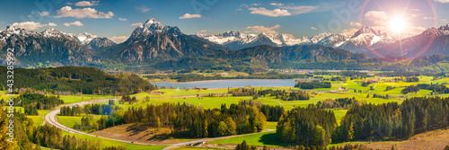 panoramic landscape with alps mountain range at springtime