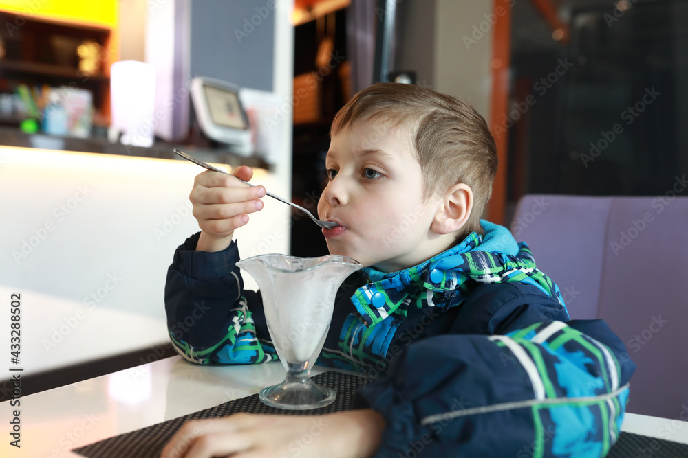 Child has ice cream Child has ice cream