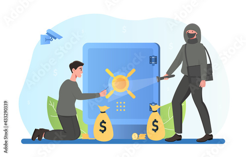 Burglar breaking safe to steal money or treasure