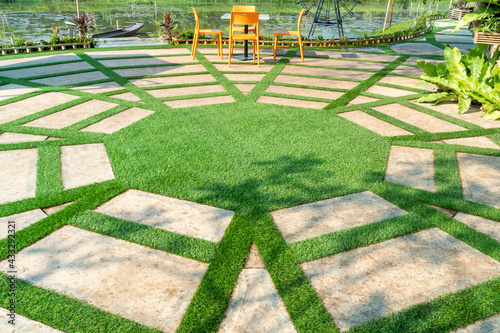 decoration floor by artificial grass and concrete.