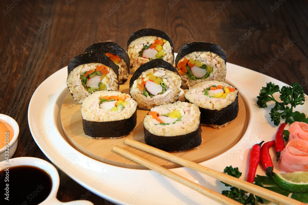 hot roll set sashimi japanese food on wooden background hot roll set sashimi japanese food on wooden background