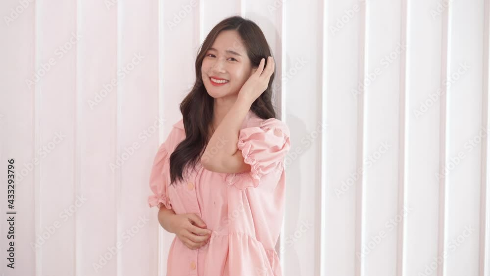 Happy pretty woman smile. Cute girl in studio Happy pretty woman smile. Cute girl in studio