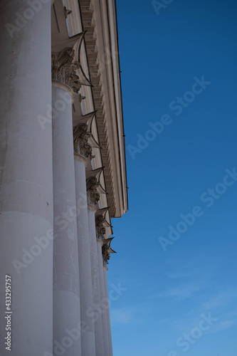 Columns. This photo can be used to show an example of ancient structures, to show the contrast of buildings and the bright blue sky. It will be the perfect background for your desktop.
