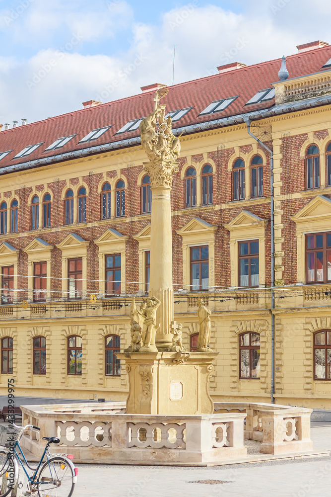 Trinity Column and high school in Main Square, Keszthely, Lake Balaton, Hungary, Europe