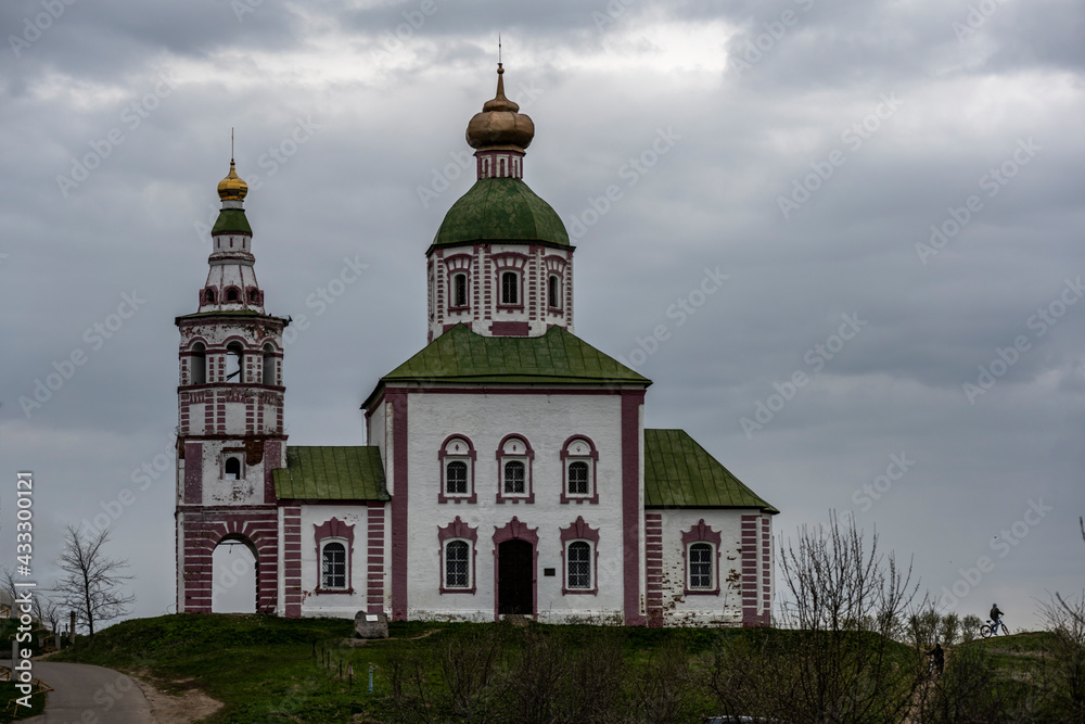 city views of the old kremlin churches and the monastery of the city of Suzdal during the rain