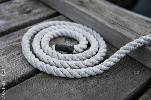 A perfect circle of white old rope. Sailing and Maritime concept.