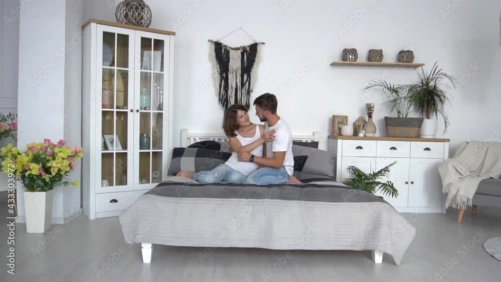 Loving couple lying in bed Slow Motion Loving couple lying in bed Slow Motion