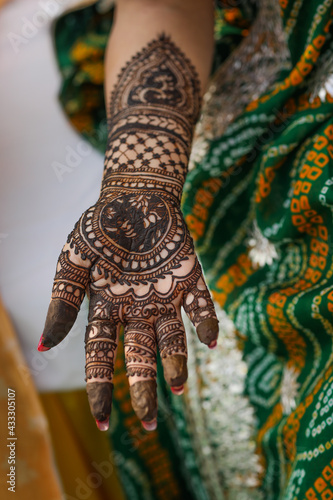 Bridal mehndi- henna tattoo on woman s hand